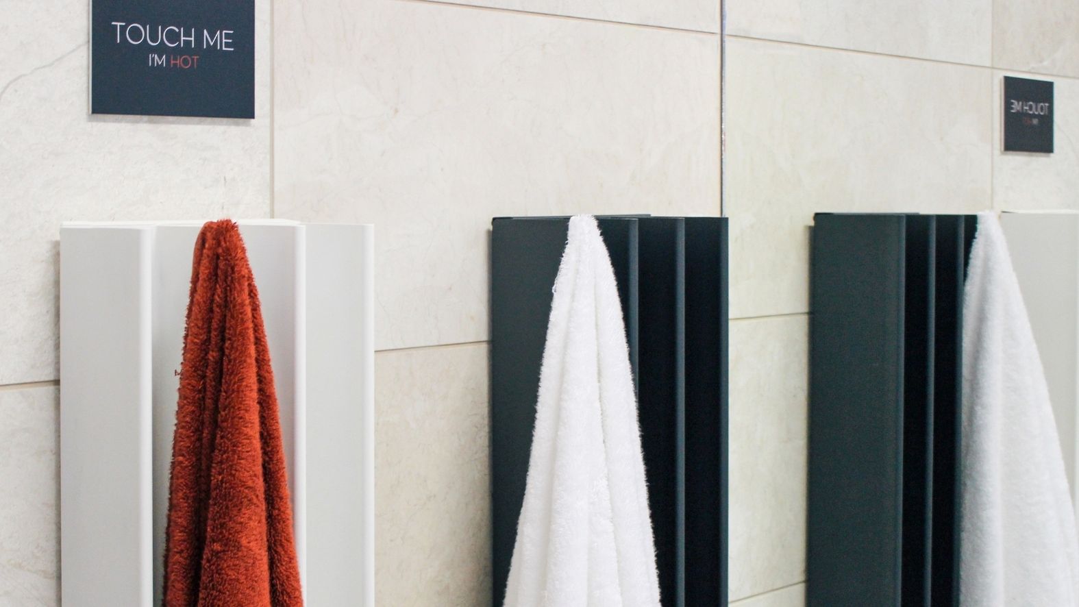 Three colours of the Gordon heated towel rail range