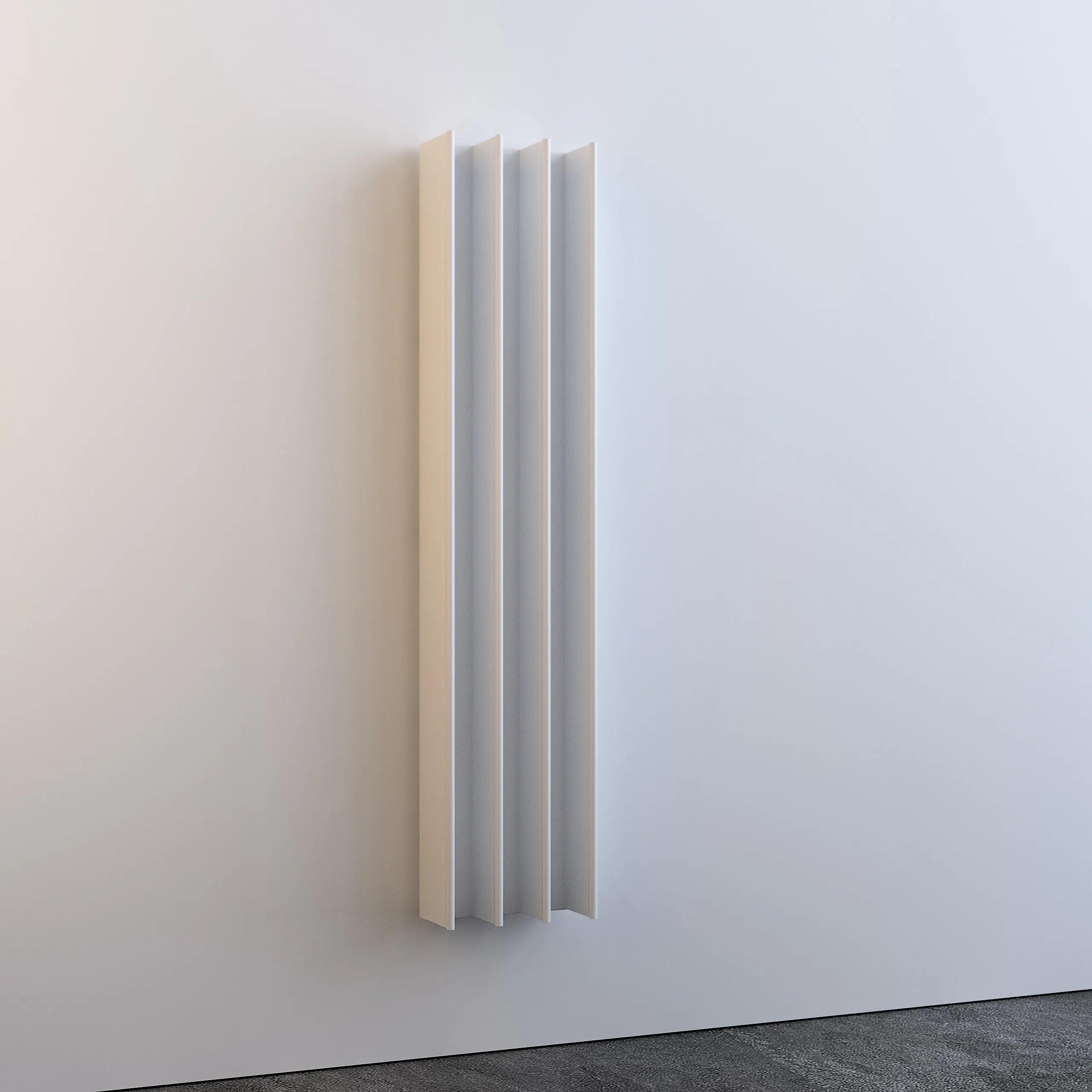 gordon heated towel rail white mounted on a black white wall