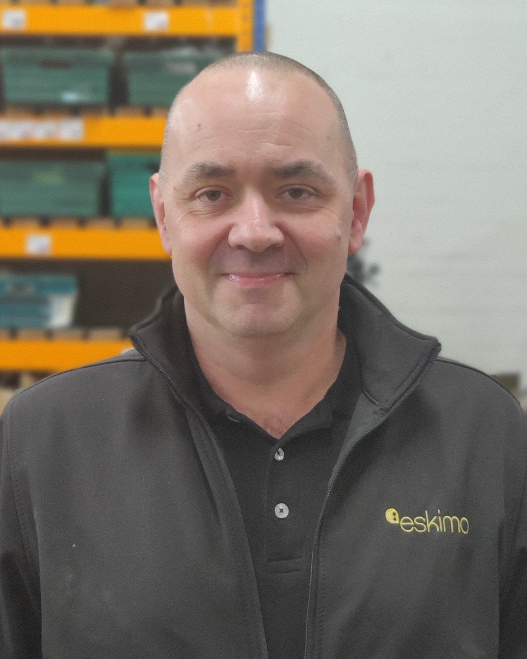 Man smiling in warehouse