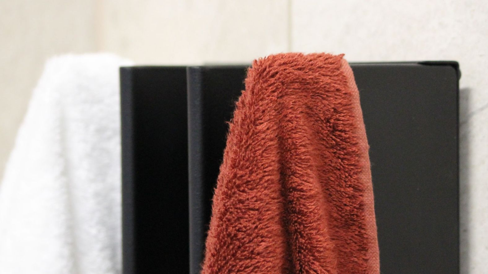 Close up of Gordon heated towel rail non-slip coat